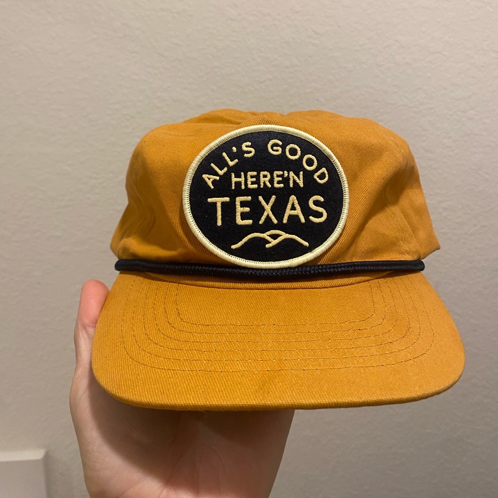 Mustard yellow hat, from Raquet and Jog
